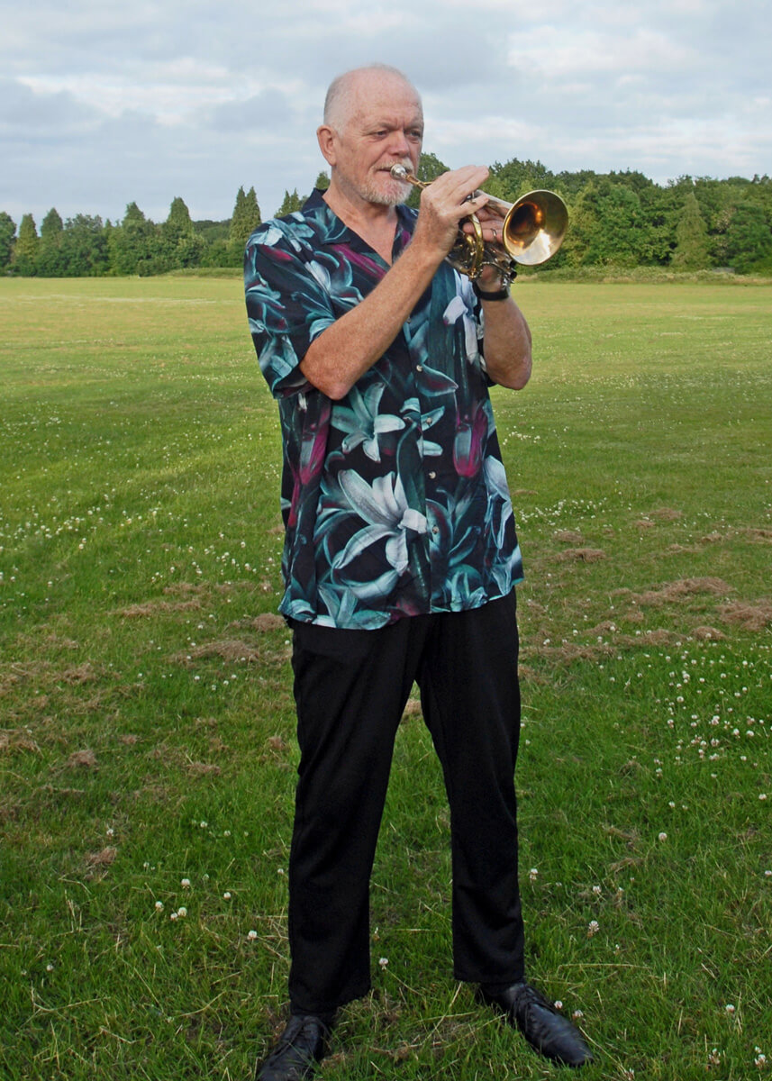 Pete Leonard standing with trumpet